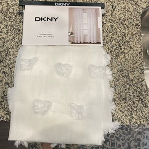 White pom pom curtains